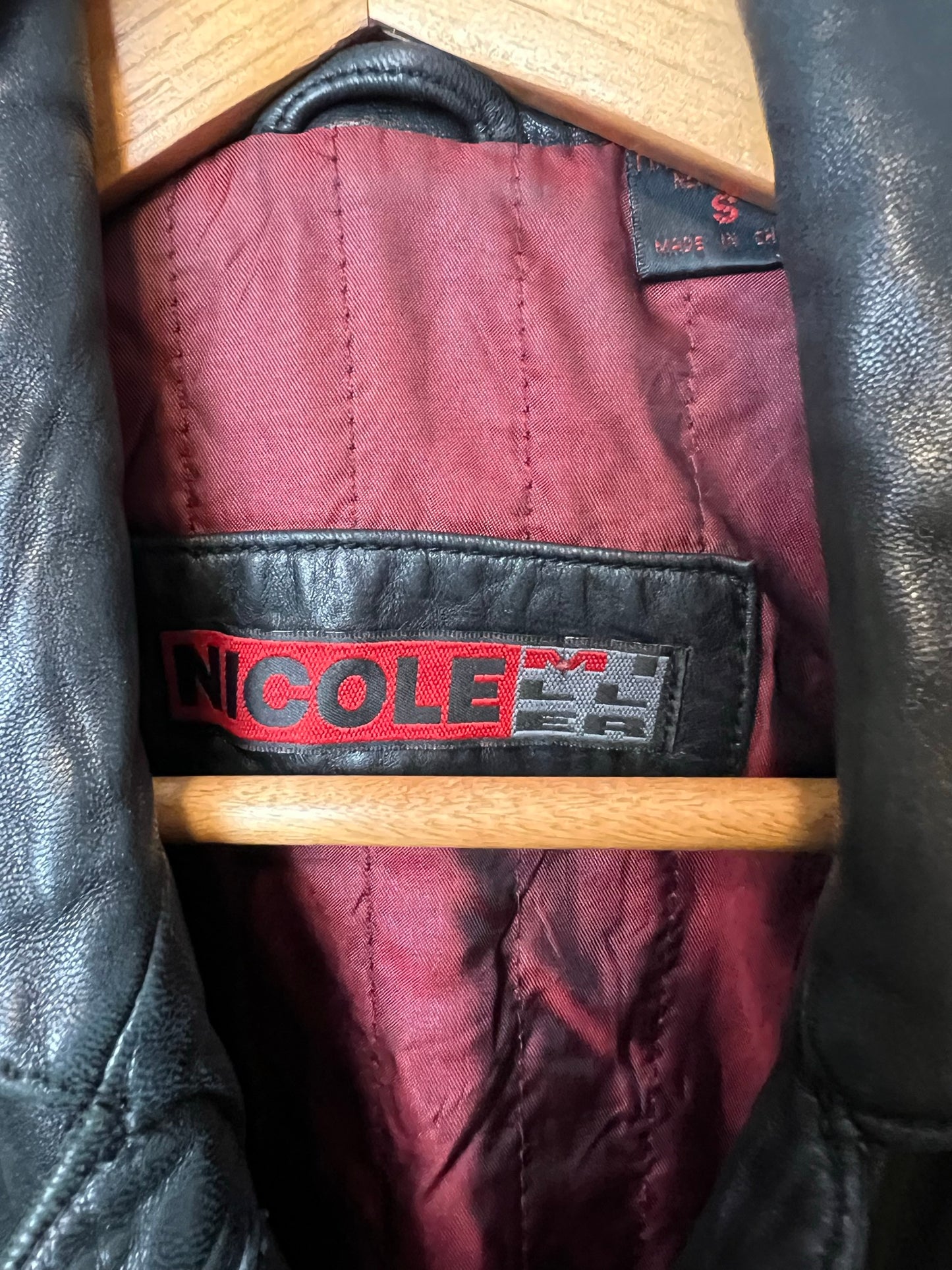 Nicole Black Leather Double-Breasted Coat with Red Lining